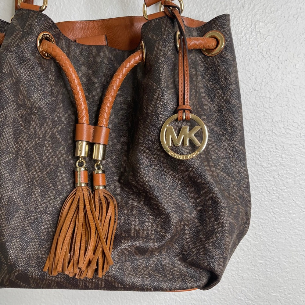 Michael Kors Brown Monogram Drawstring Shoulder Bag with Leather Tassels Gold HW - Picture 2 of 9